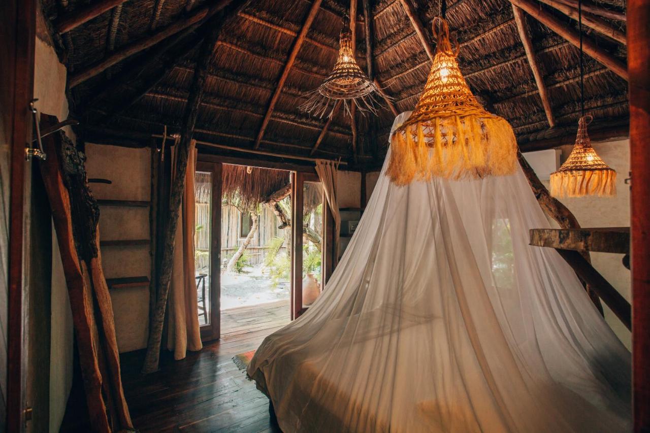 Ikal Tulum Hotel Dış mekan fotoğraf Interior of a bungalow at the resort