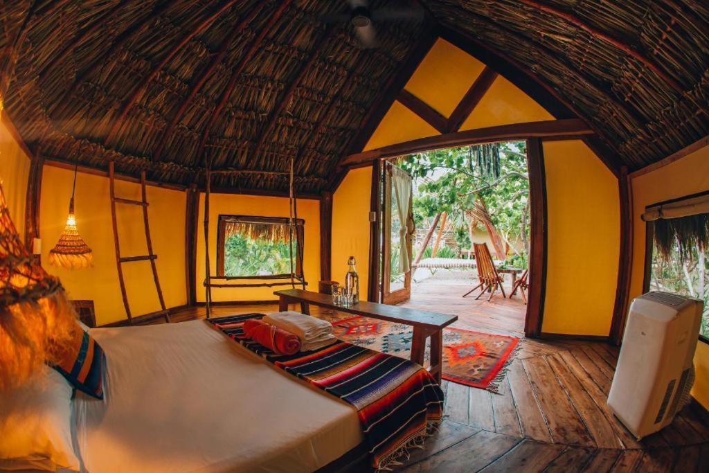 Ikal Tulum Hotel Dış mekan fotoğraf Interior of a bungalow at Xel-Ha