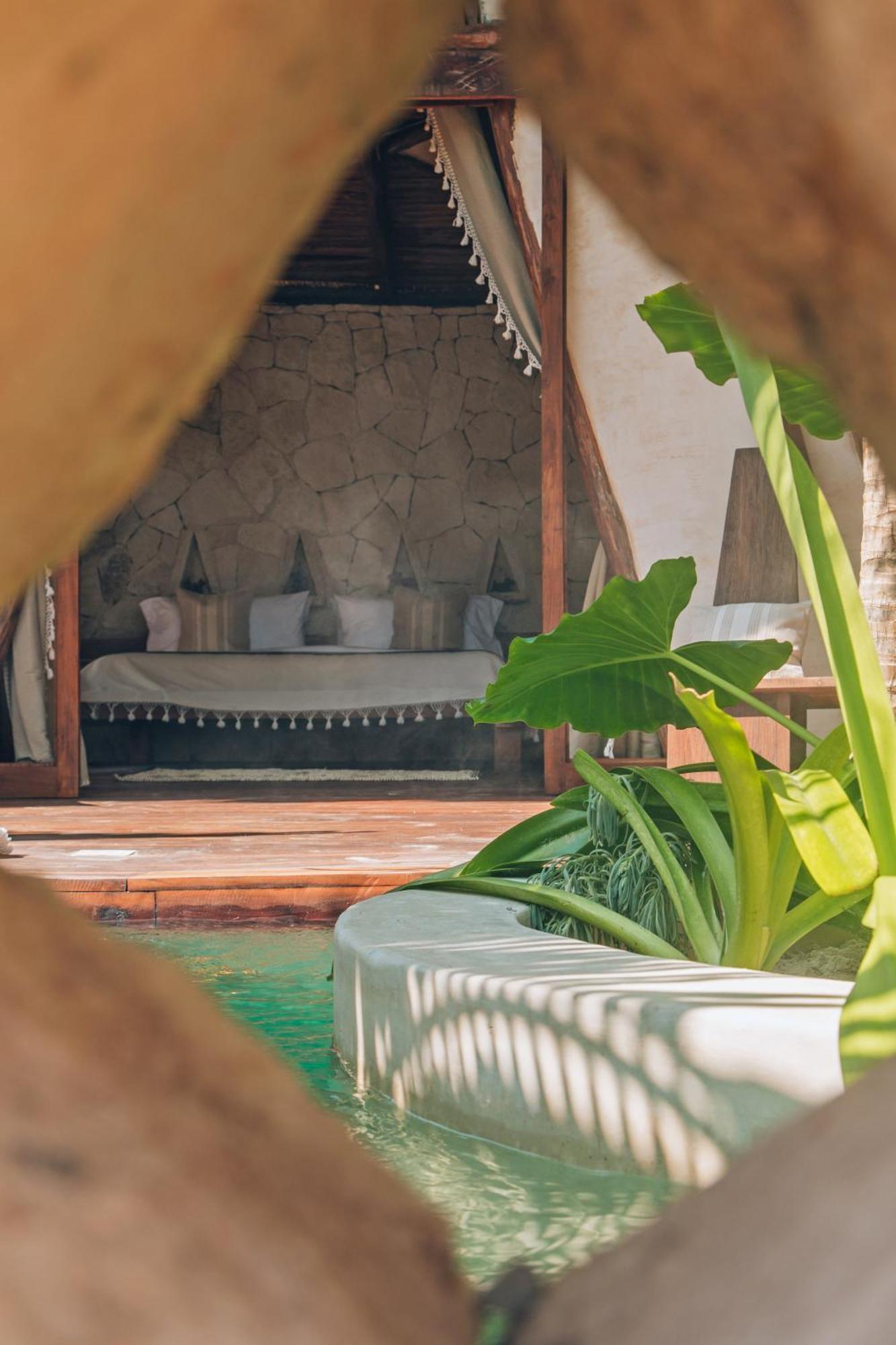 Ikal Tulum Hotel Dış mekan fotoğraf A view of the interior of a tent at the 2011 edition of the festival